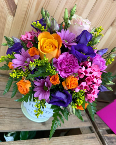 Zinc Arrangement - Bright coloured flowers in a zinc container